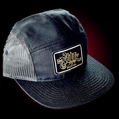 Five panel hat in black and black mesh with our full logo in gold on a black woven patch