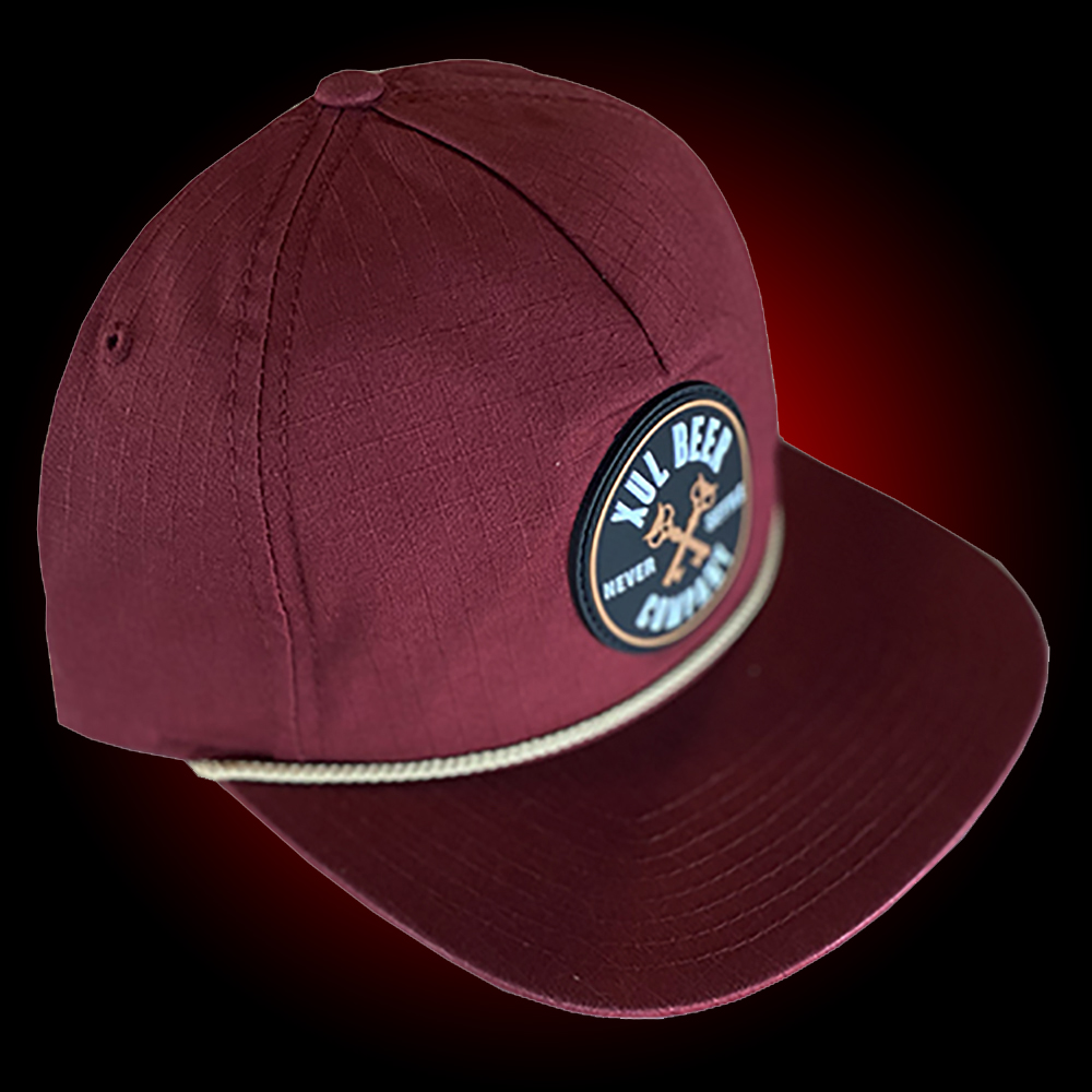 Cardinal red grandpa hat with a khaki cord. It has a round rubber patch with our circle logo.