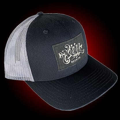 Black mesh trucker hat with our full logo on a black leather patch.
