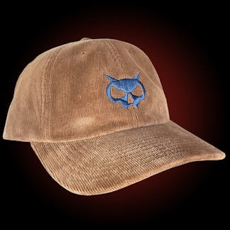 corduroy dad hat with our fang head logo in blue