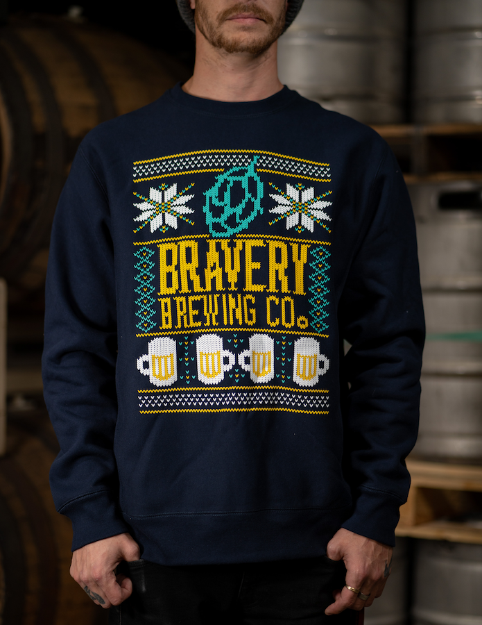 navy crew neck sweatshirt with light blue, yellow, and white Christmas sweater design