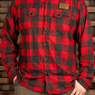 Red and black plaid flannel shirt with leather Bravery Brewing logo patch above left chest pocket