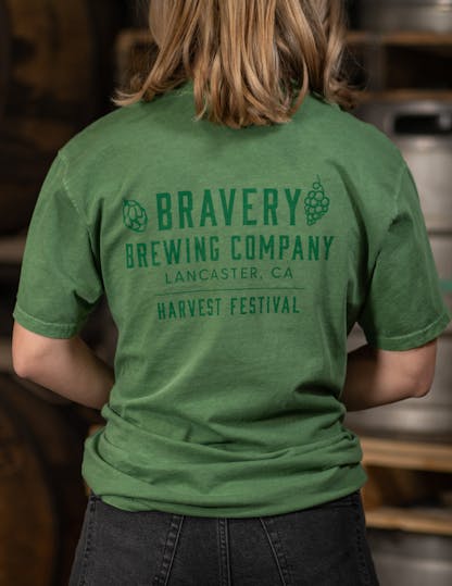 Back of green t-shirt with Bravery Brewing Company Harvest Festival logo