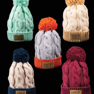 knit beanies with pom-pom ball and leather Bravery Brewing patch