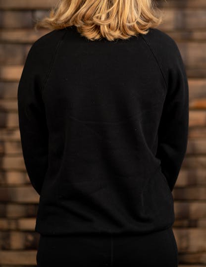 Blank back side of black sweatshirt