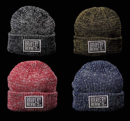 4 winter hats of different colors with Bravery Brewing patched on the front