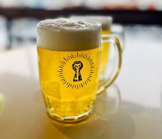 custom lager glass with xul keyhole burst logo