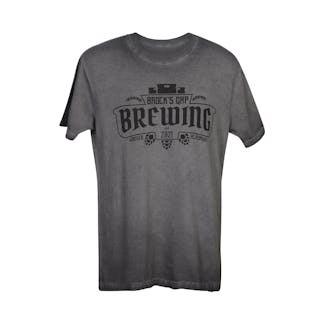 Black stone washed short sleeved crewneck tee with black Bavarian style lettering spelling out Brock's Gap above a larger printed Brewing. Underneath it says Established 2021 and Hoover, Alabama. Detailed with black barley on top and black hops underneath