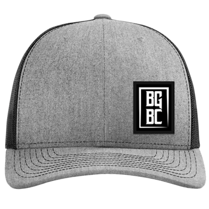 Gray front black mesh Richardson snapback trucker hat with black patch on right of hat with BGBC in white