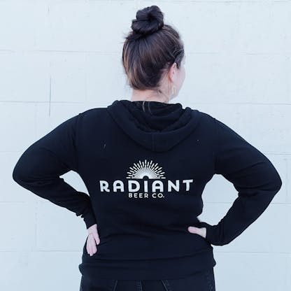 Black hoodie with Radiant Beer Co logo on back