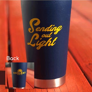 radiant insulated steel pint glass with text, "Sending Out Light"
