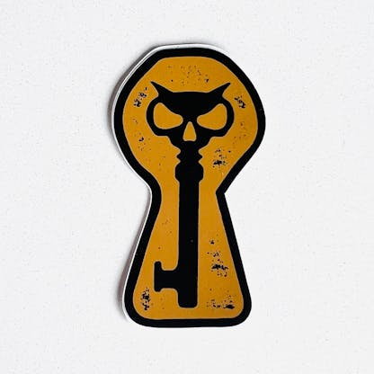 single keyhole icon sticker in gold