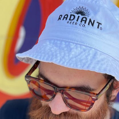 radiant beer white bucket hat with black embroider logo