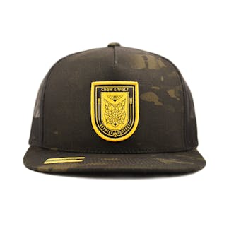 Black camouflage hat with mesh back and shield logo on front in front view