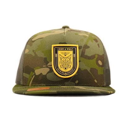 camouflage hat with mesh back and shield logo on front and front angle