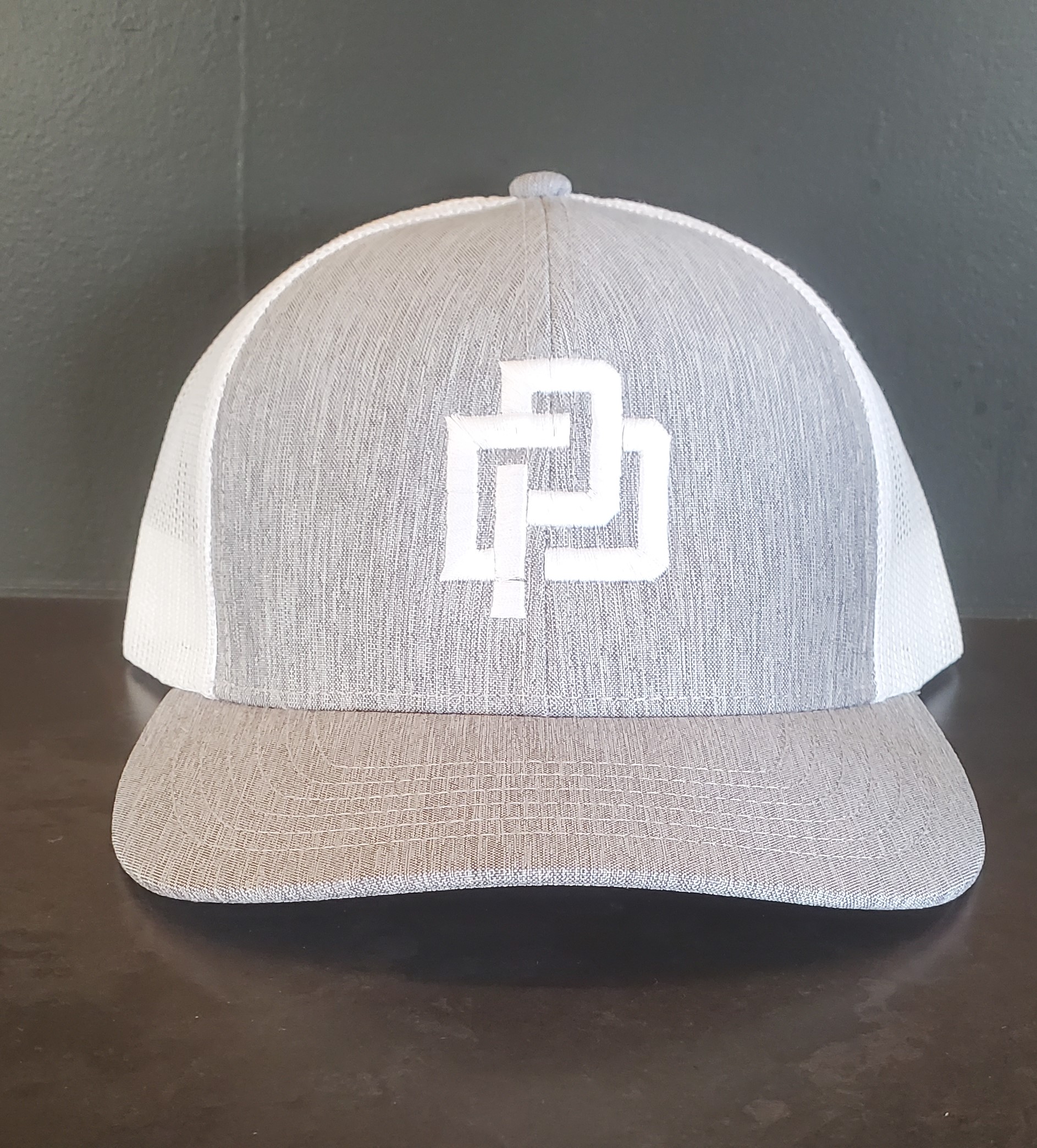 Gray trucker cap with PD logo
