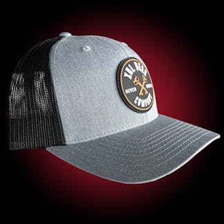 light gray trucker hat with a black rubber patch