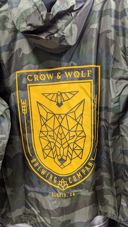 close up of gold shield on back of windbreaker