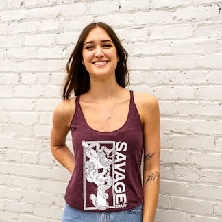 Women's racerback tank in maroon with large Savage Craft logo on front in white