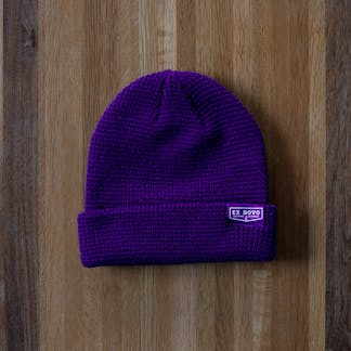 purple waffle knit beanie with clip tag text "Ex Novo Brewing Company"