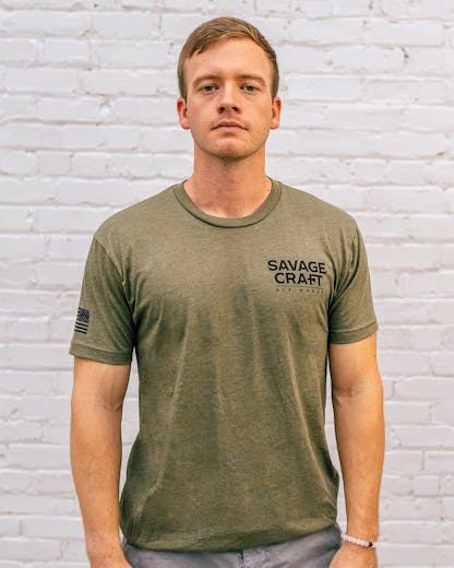 Green short sleeve T-shirt with "Savage Craft" small logo on front left in black lettering