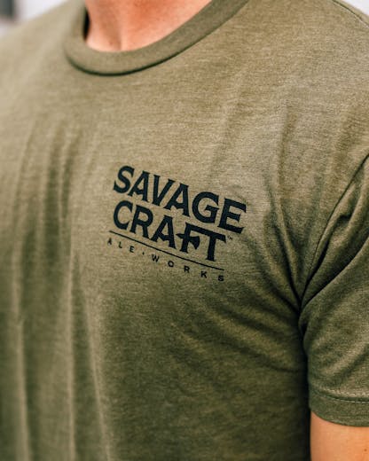 Green short sleeve T-shirt with "Savage Craft" small logo on front left in black lettering