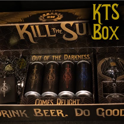 black and gold printed box with open lid and contents showing. four 16oz black cans with different color graphics, stem teku glass to the right and black flask to the left. text "KTS Box" at top right in bright gold. text at bottom "Drink Beer. Do Good." in matte gold. center text "Kill the Sun. Out of the Darkness Comes Delight"
