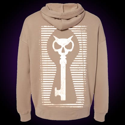 tan hoodie with white keyhole logo on back and white Xul logo on front