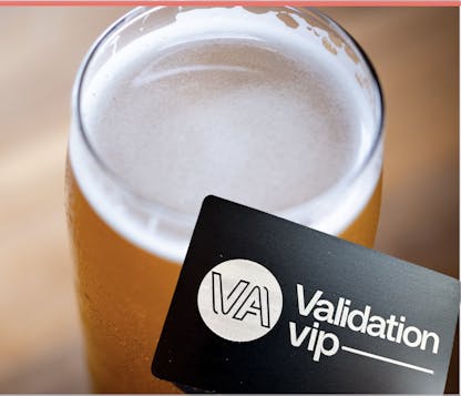 Beer with black metal validation vip card