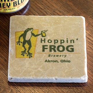 stone coaster with Hoppin' Frog logo