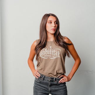 woman wearing olive tank top with Liability Brewing