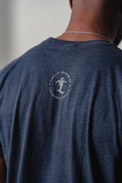 man wearing navy shirt with SC state logo