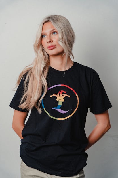 woman wearing black shirt with rainbow jester L