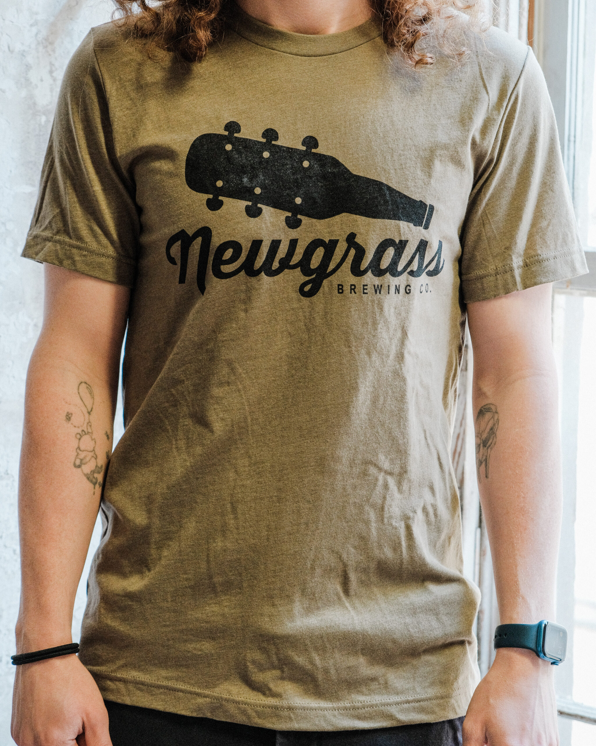 Army green short sleeve t-shirt with large Newgrass Brewing logo in black