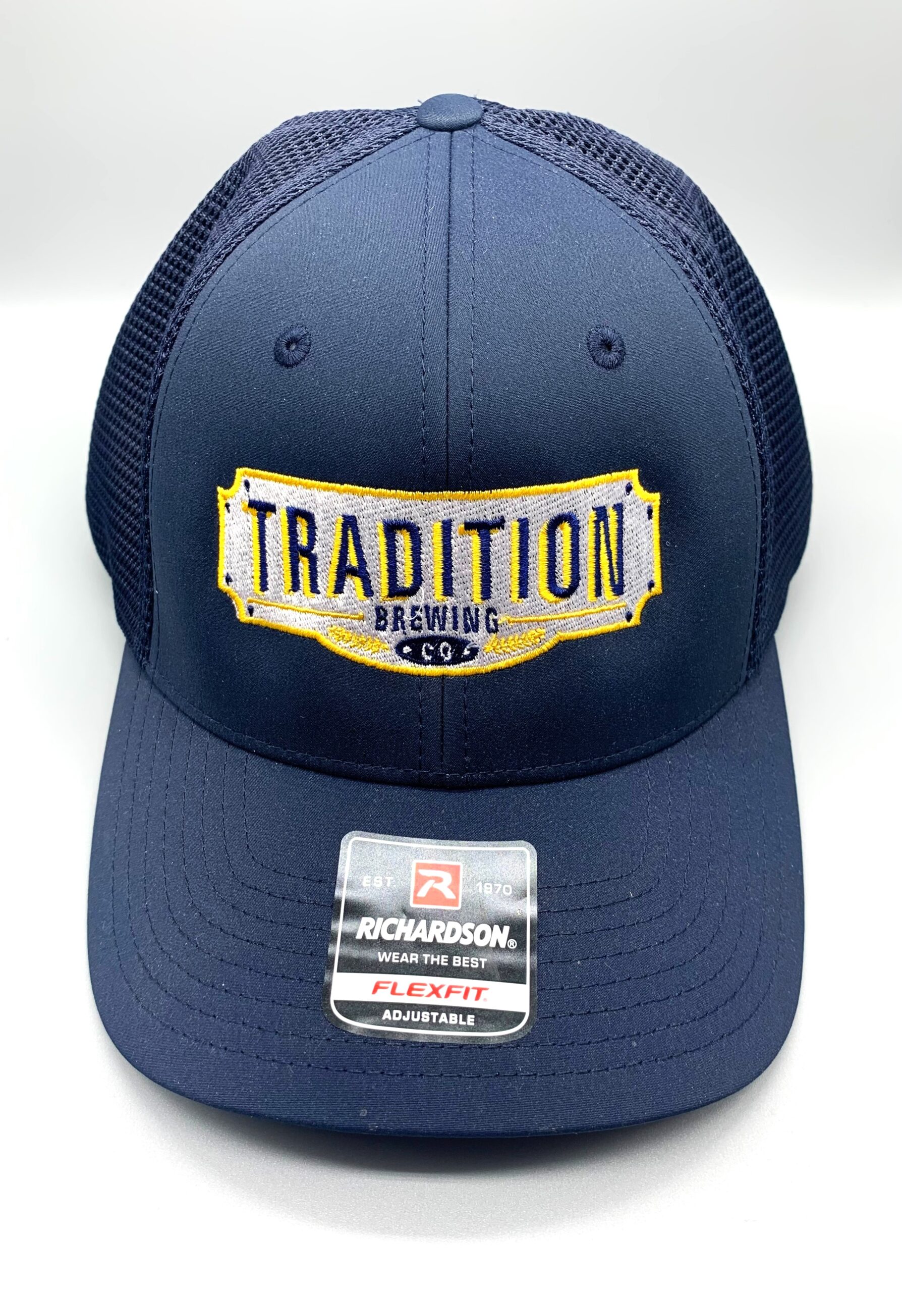 Navy blue hat with shield logo