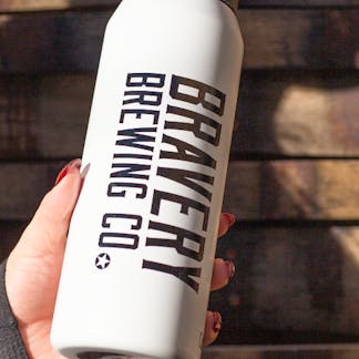 White Bravery CamelBak water bottle – 32oz. Text "Bravery Brewing Co." is printed along the side in black