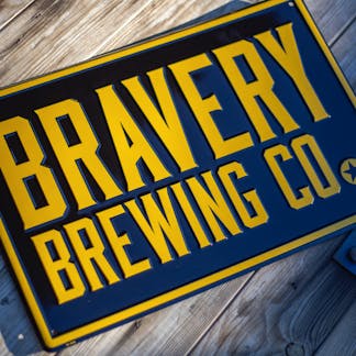Bravery Brewing Co. metal "tin tacker" sign
