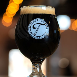 12oz tulip glass with circle logo