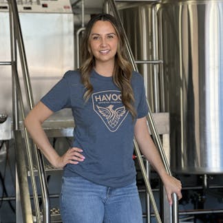 Blue t-shirt with havoc brewing logo in gold