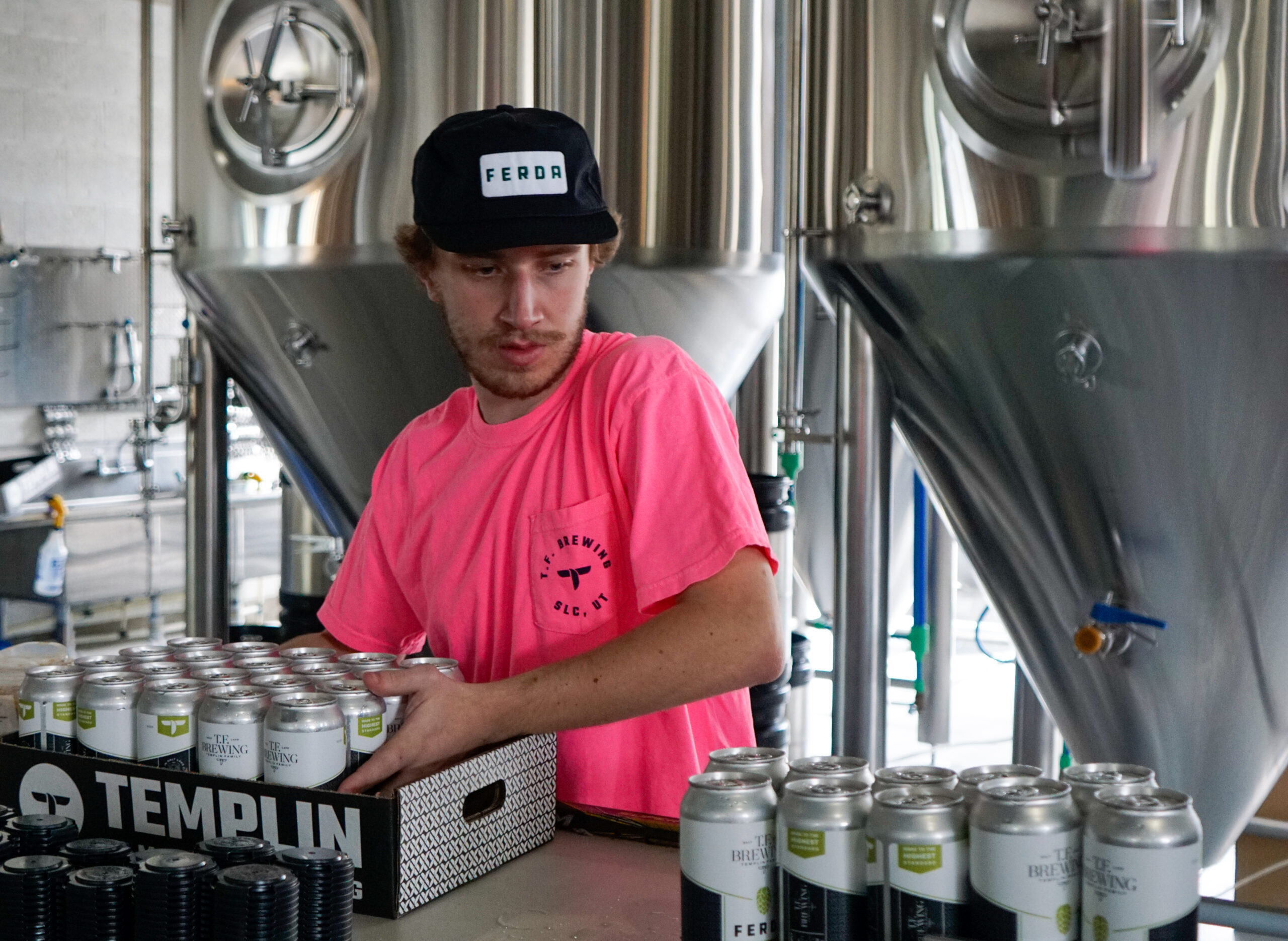 Neon Pink pocket T with T.F. Logo on the left chest pocket.