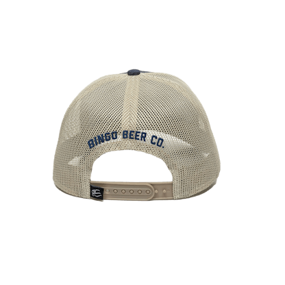 Navy trucker hat with tan mesh panel in back and leather Bingo Brewing logo patch