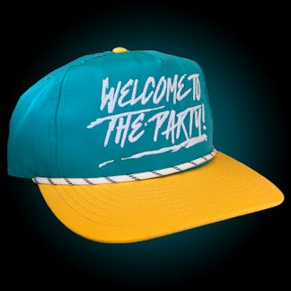 Teal unstructured 5-panel hat with yellow bill. White Welcome to the Party on front.