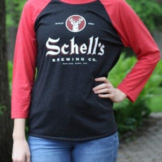 Red and black tee shirts that says schells