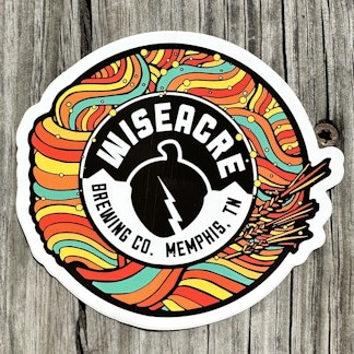 Red, blue, yellow, and orange swirls surrounding the black and white Wiseacre Acorn Logo