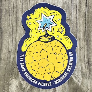 Navy and yellow sticker with Tiny Bomb beer art surrounded by text "TINY BOMB AMERICAN PILSNER WISEACRE BREWING CO"