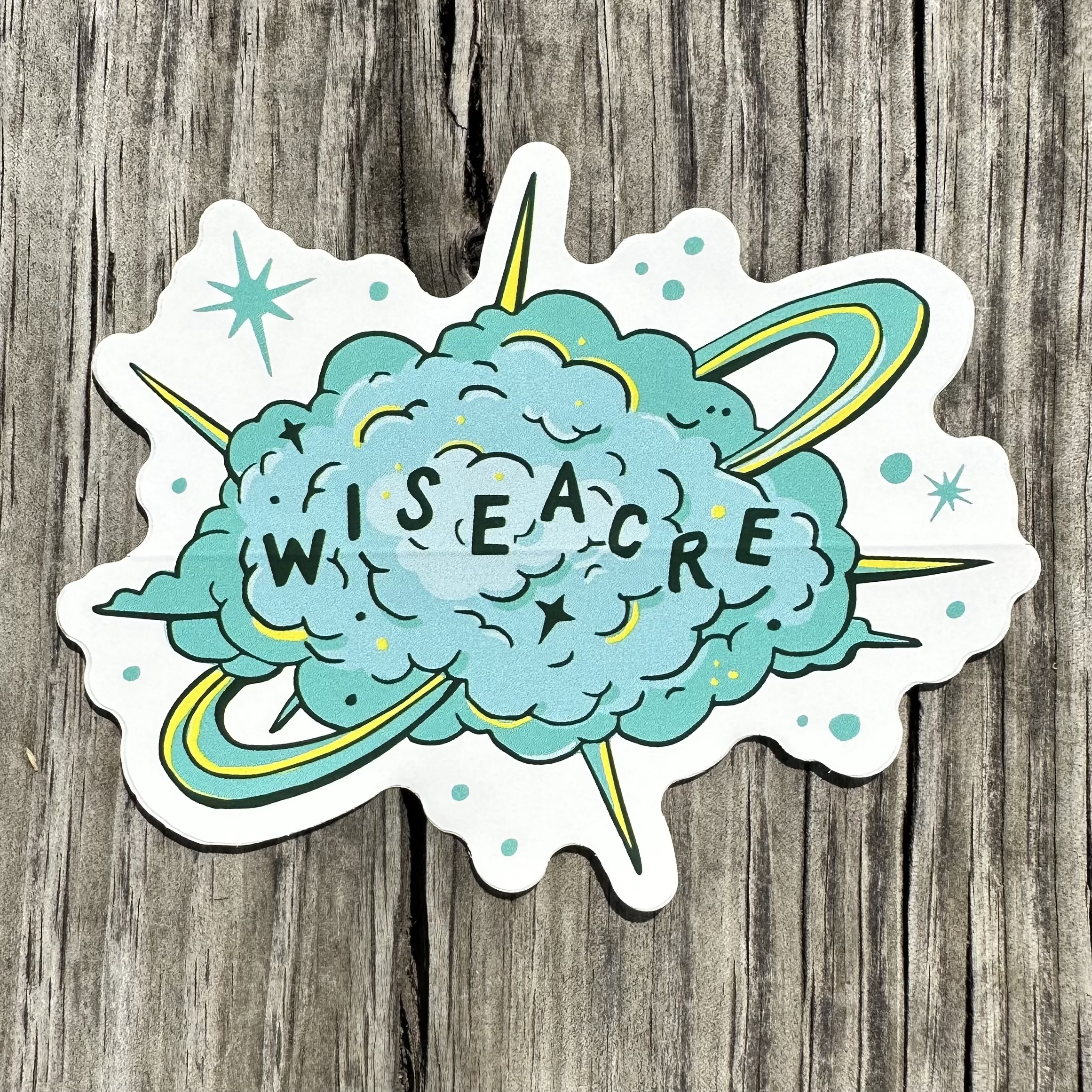 Blue and Yellow Cat Fight Cloud Sticker with Wiseacre written across the middle