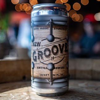 32oz Can with New Groove branded drum decoration