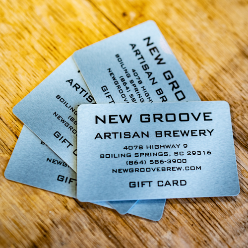 New groove gift card sitting on a table