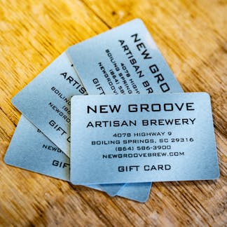 New groove gift card sitting on a table