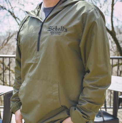 A man wearing a green Jacket from Schells 